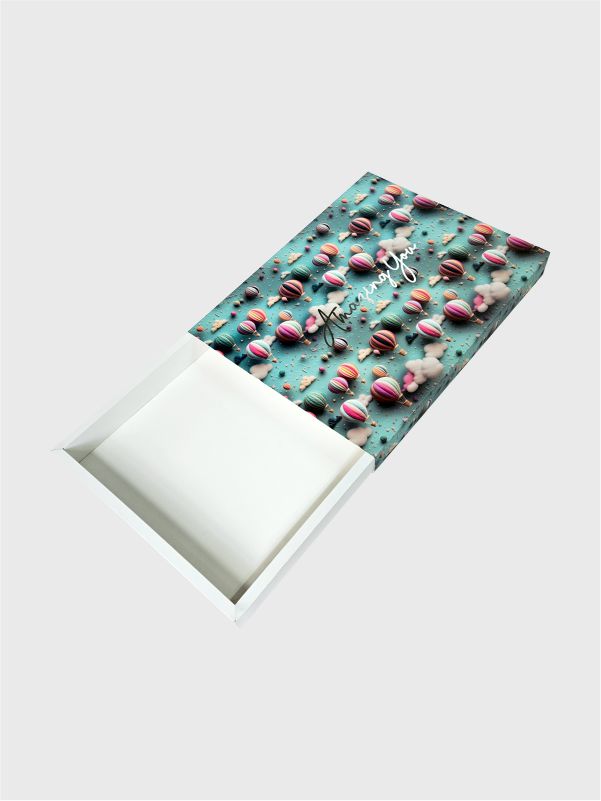 Eco friendly SBS box showing tray sliding out from hot air balloon printed sleeve