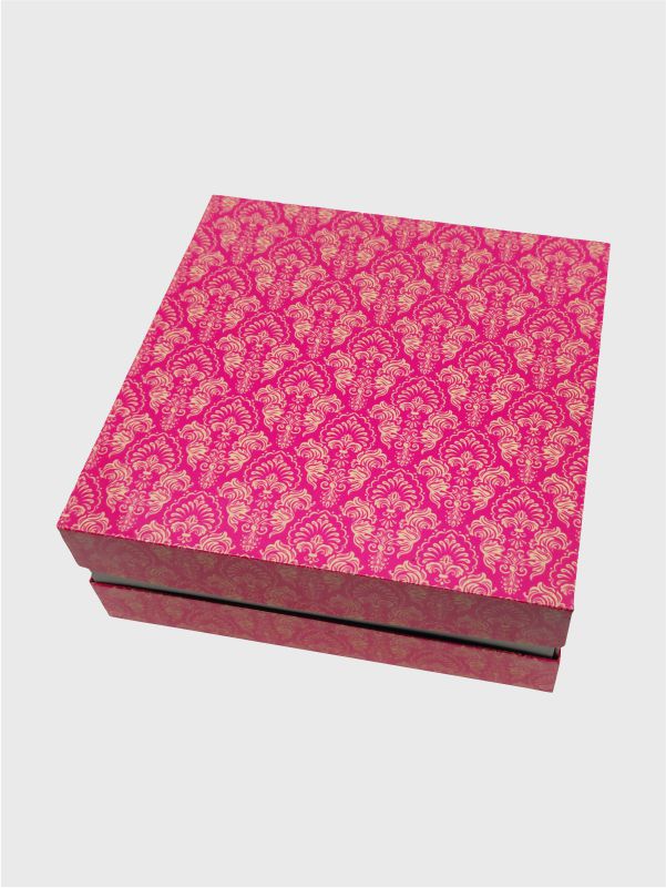 Top view of pink filigree kappa box for wedding gift packaging
